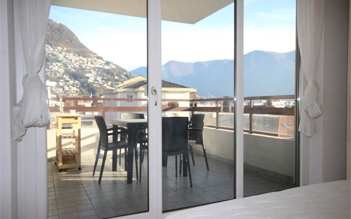 Attico con terrazza e vista aperta in prossimità del centro