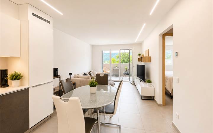 Cadempino: moderno 2.5 locali con balcone e posto auto